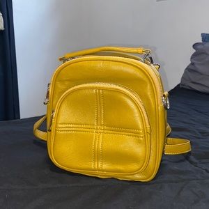 This bag can be turned into a purse as well as a back pack. It is good quality.